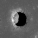 Illustration for article titled What's hiding behind these giant holes on the Moon?
